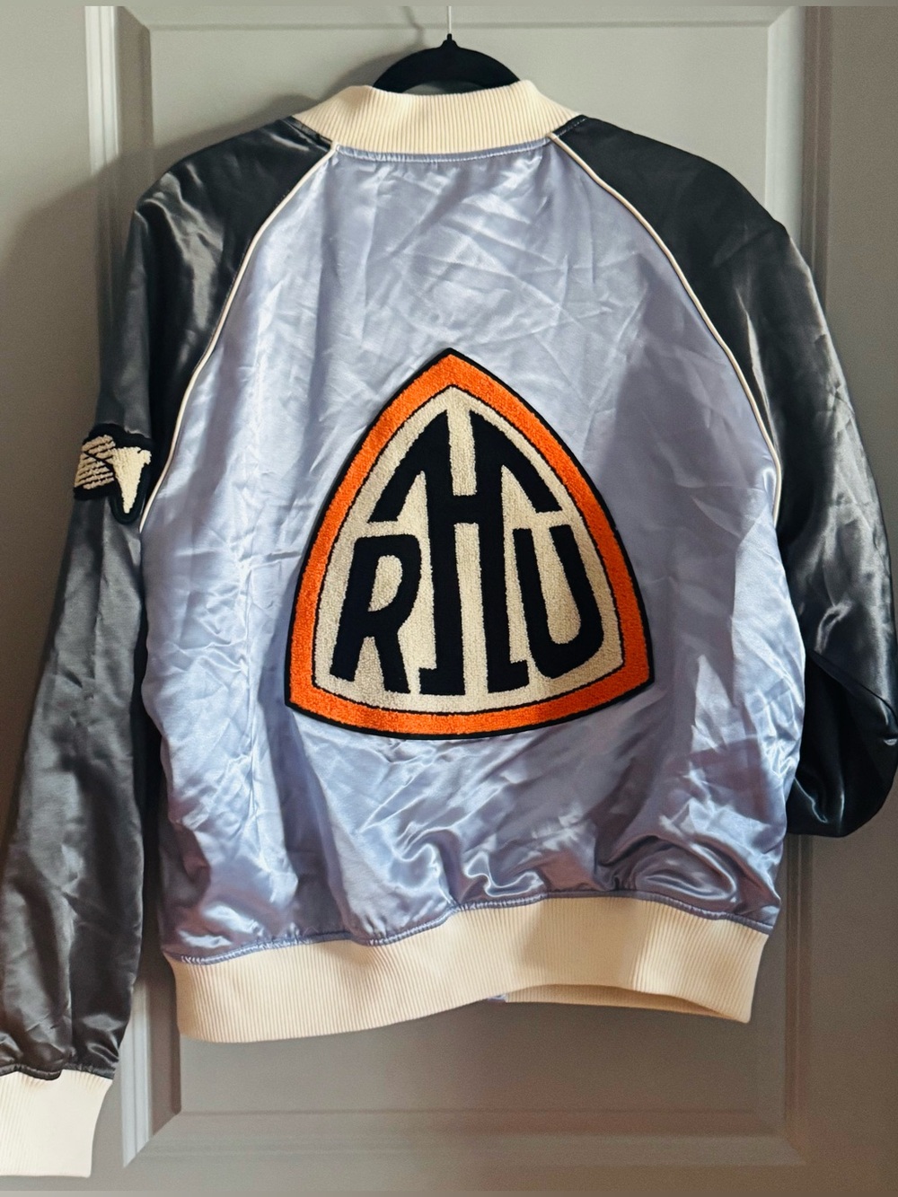 Zara Light Blue Satin Bomber Jacket with Black Sleeves and Cream Trim